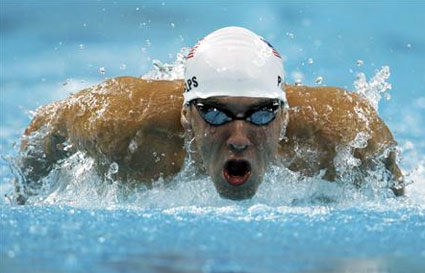 Michael Phelps wins 1st Gold