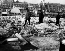 FEBRUARY 1904: Frozen Ohio River. Anyone up for a brisk stroll could walk the OHio River in 1904 and agin in 1977. Durting those years, the winter weather was so cold, for sucha a long time, the river froze. The Ohio wasn't rock solid from surface to riverbed. But the freeze was long enough - 56 days during the winter of 1903-04 - and thick enought - 12 inches on January 19, 1977 - for daredevils to walk from Cincinnati to Covington. And back.
The Enquirer/Helen Drahman
CAPTION INFORMATION TAKED FROM "CINCINNATI MOMENTS" PAGE 12