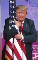 trump-hugs-flag_s