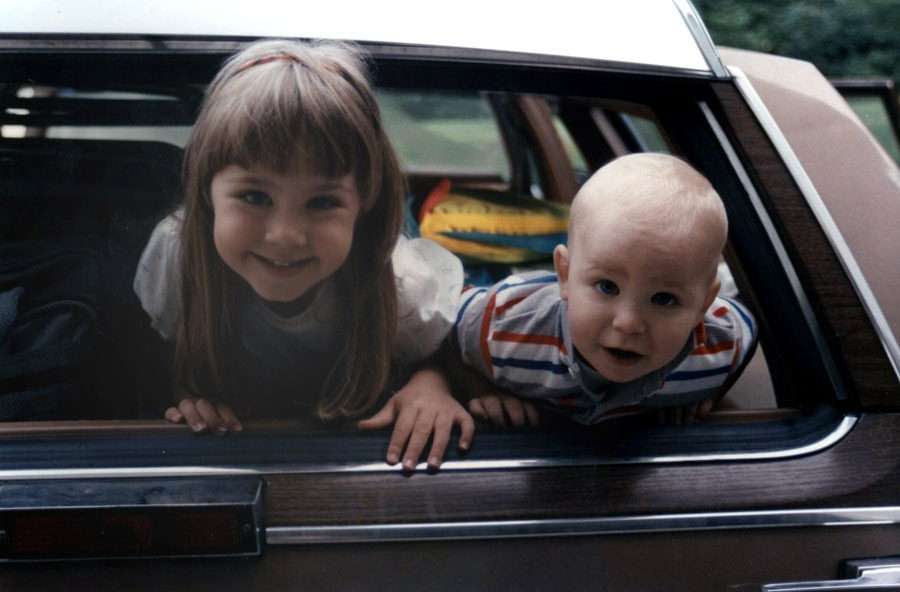 Katelyn and Taylor rear window of the Oldsmobile Custom Cruiser Station Wagon